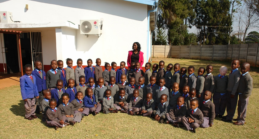 Above: Mrs Mufunda and Grade ECD B1 class 2015